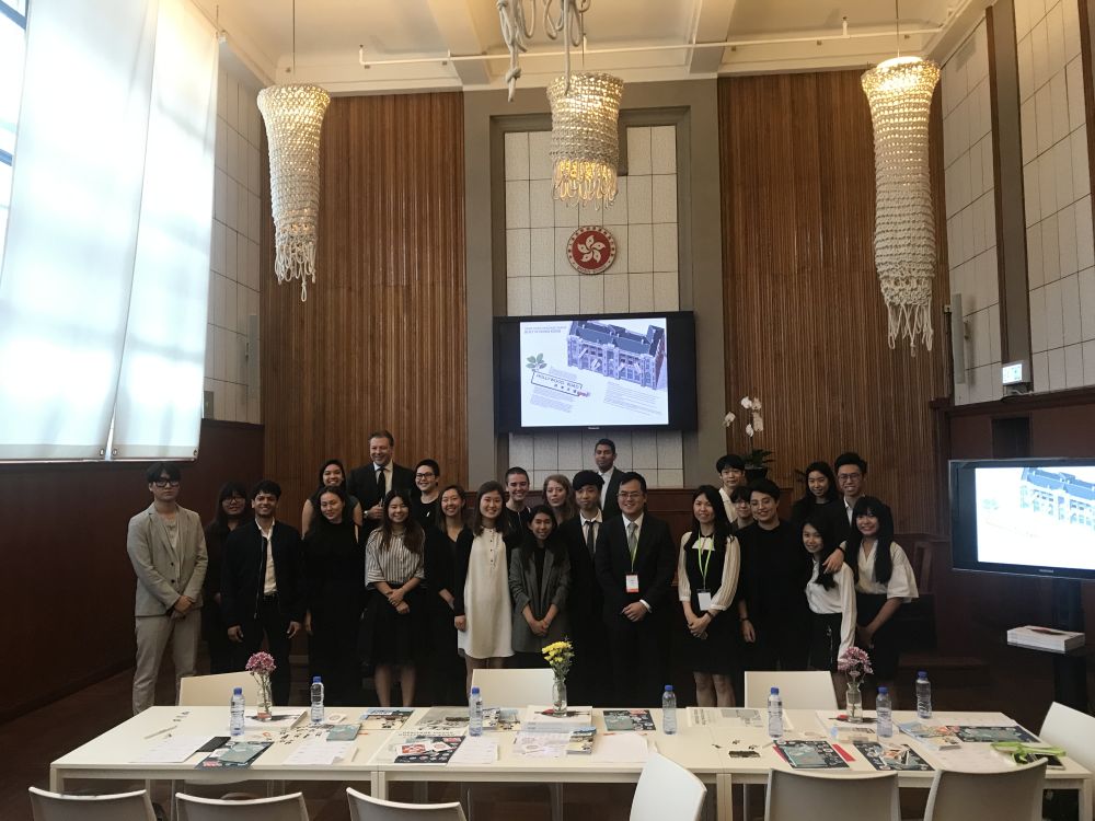 The Commissioner for Heritage’s Office has collaborated with SCAD Hong Kong and invited its students to join a competition to produce design package for promotion of the “Heritage Vogue．Hollywood Road” street carnival.  Picture shows the jury and the professors and students of SCAD Hong Kong at the design presentation.