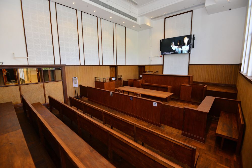 The magistrate’s bench, prisoner's dock, public sitting area, reporters’ bench, wooden flooring and staircases, etc. have been preserved in Court No. 2.