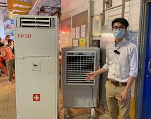 The EMSD’s Engineer (Municipal), Mr WAN Lap-hang, says the department has installed mobile air handling units, like the one next to him, in about 30 markets across the territory to improve ventilation and increase air change rates inside the markets.