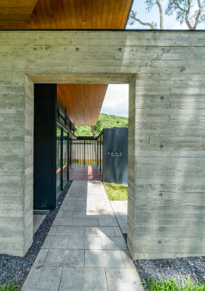 Fair-faced concrete imprinted with wood pattern is the main construction material of the façades of Hoi Ha Visitor Centre to emanate a rustic and natural feeling.