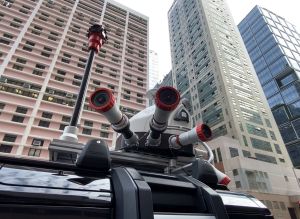 The Mapping System of the survey vehicle comprises a 360-degree spherical camera mounted atop the vehicle, several high-definition cameras, a 3D laser scanner, a global navigation satellite system receiver, positioning equipment, etc.