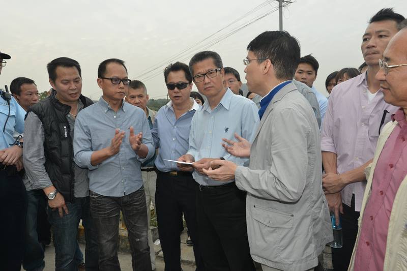Representatives of Yin Kong Village express their views to Mr Chan (fourth left)..