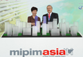 The Secretary for Development, Mrs Carrie Lam, and President of Reed MIDEM, Mr Paul Zilk, officiate at the MIPIM Asia 2011 opening ceremony today (November 15).