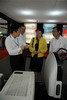 One of the exhibitors in the 4th Exposition on Green Construction and Energy Conservation introduces the latest technology on energy conservation to the Secretary for Development, Mrs Carrie Lam, and the Permanent Secretary for Development (Works), Mr Wai Chi-sing. 