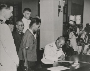 In 1945, Japan was defeated. Vice Admiral Ruitaro Fujita signed the surrender document at Government House.