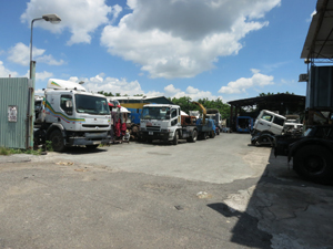 A parking and vehicle repair yard.