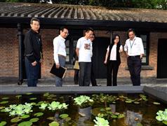 The Secretary for Development, Mr Michael Wong (first right), today (July 28) visits the Jao Tsung-I Academy and is briefed on the lotus pond called "Light and Shadow" in the Academy. Looking on are the Director of Buildings, Mr Cheung Tin-cheung (third left); the Managing Director of the Urban Renewal Authority, Mr Wai Chi-sing (second left); and the Chairman of the Sham Shui Po District Council, Mr Ambrose Cheung (first left).