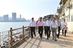 The Secretary for Development, Mr Michael Wong (third left), visits Lei Yue Mun, Kwun Tong today (October 25) to inspect typhoon-affected areas and related follow-up work. Mr Wong is accompanied by the Chairman of Kwun Tong District Council, Dr Bunny Chan (second left), and the District Officer (Kwun Tong), Mr Steve Tse (first left).