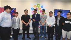 The Secretary for Development, Mr Michael Wong, visited Eastern District today (May 3). Photo shows Mr Wong (forth left) chatting with students of the engineering discipline of the Institute of Vocational Education (Chai Wan) to learn more about their school life and studies. 