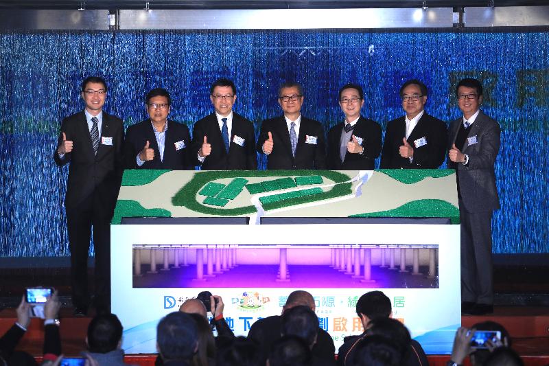 Pictured from left, the Deputy Chairman of Chun Wo Development Holdings Limited, Dr Derrick Pang; the Chairman of the Wan Chai District Council, Mr Stephen Ng; the Director of Drainage Services, Mr Edwin Tong; the Financial Secretary, Mr Paul Chan; the Secretary for Development, Mr Eric Ma; Member of the Legislative Council Dr Lo Wai-kwok; and the Director of Property of the Hong Kong Jockey Club, Mr Philip Chen, officiate at the commissioning ceremony of the Happy Valley Underground Stormwater Storage Scheme today (March 16).