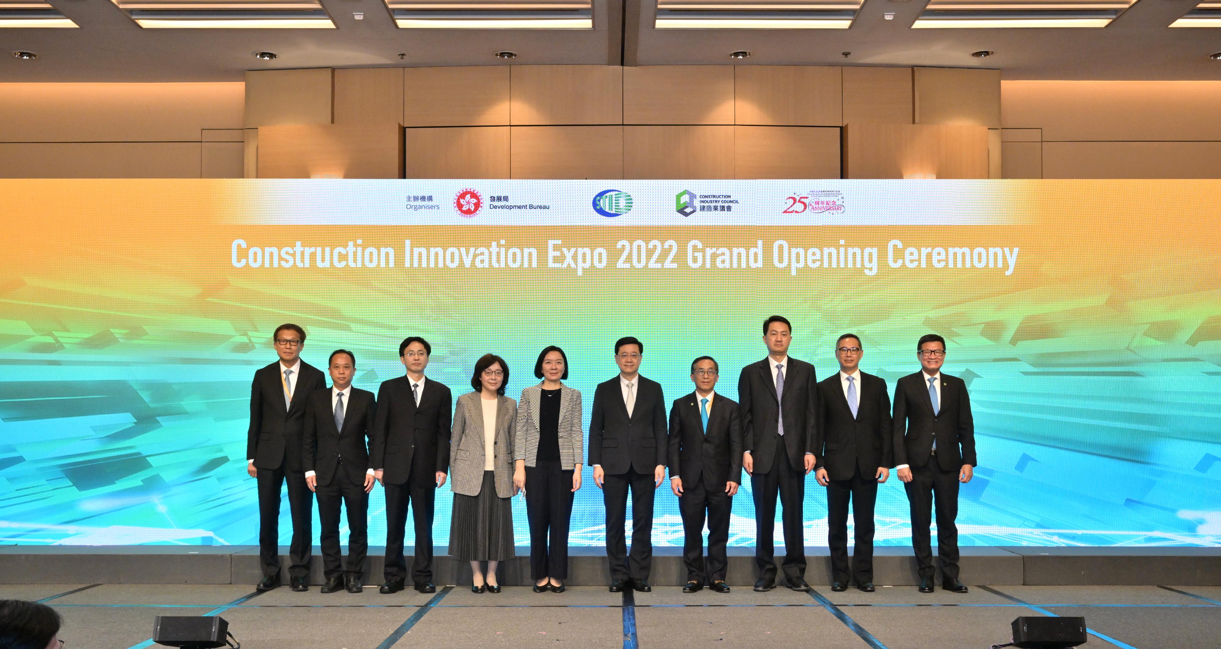 The Chief Executive, Mr John Lee, attended the Construction Innovation Expo 2022 Grand Opening Ceremony today (December 13). Photo shows Mr Lee (fifth right); Deputy Director of the Liaison Office of the Central People's Government in the Hong Kong Special Administrative Region Ms Lu Xinning (fifth left); the Director-General of the Department of the Construction Market Supervision of the Ministry of the Housing and Urban-Rural Development of the People's Republic of China, Mr Zeng Xianxin (third right); the Secretary for Development, Ms Bernadette Linn (fourth left); the Chairman of the Construction Industry Council, Mr Thomas Ho (fourth right), and other guests at the ceremony.