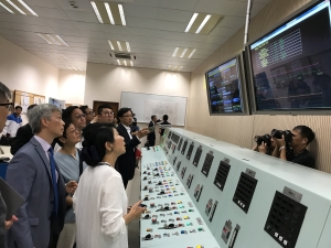 LegCo Members listen attentively to a briefing at the DJ water quality surveillance station at the Muk Wu Pumping Station.