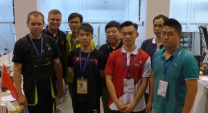 Hong Kong Team members have the opportunity to make friends with contestants from other places at the competition.  Mr CHAN Siu-lam (second right, front row) competes in “Electrical Installations”.