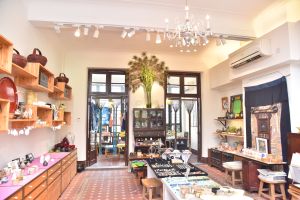 The original wooden double doors that lead to the balcony and the original floor tiles have been preserved.