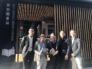 Senior Property Services Manager of the Architectural Services Department, Mr LAU Cheuk-kit, Paul (second left), says that the architectural design concepts for the self-service library station originate from bamboo writing slips.  This design, together with a modern spatial layout, the use of environment-friendly construction materials and a barrier-free design, aims to create a comfortable, harmonious environment.  In the picture is Mr Paul LAU with the project team in front of the library station.