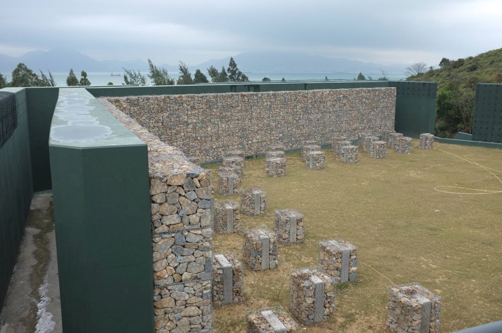 A debris barrier built by the GEO at Cheung Tung Road, Tung Chung, to reduce the landslide risks of natural hillsides.