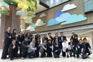 SDEV, Mr Michael WONG (fifth right, front row); Director of Architectural Services, Mrs Sylvia LAM (fourth right, front row); and the ArchSD team pose for a group photo in the lobby of the HKCH.
						