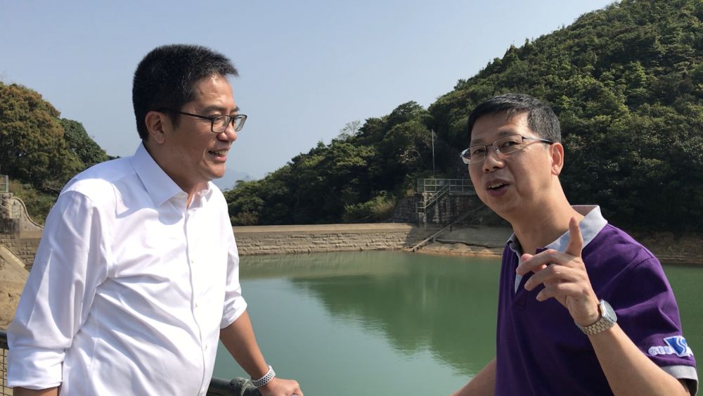 Director of Water Supplies, Mr WONG Chung-leung (right), briefs the Secretary for Development (SDEV), Mr WONG Wai-lun, Michael, on the history of the Tai Tam Group of Reservoirs and some of the declared monuments on the Tai Tam Waterworks Heritage Trail.
