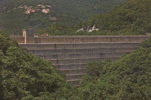 The Tai Tam Upper Reservoir Dam was originally 90 feet high.  In order to expand the capacity of the reservoir, the Government increased its height by 10 feet in 1897.  If you look at the dam carefully, you can see the difference between the added part at the top and the part previously built.