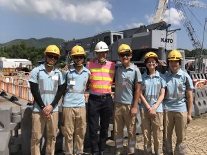 The Hong Kong Institute of Construction was set up at the beginning of this year to train more high-calibre and professional construction practitioners.  Pictured is the SDEV, Mr Michael WONG taking photos with young learners during his visit to the Construction Industry Council Tai Po Training Ground.