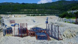 Protective measures such as blasting cages and vertical screens would have to be provided at the blast locations, with a view to protecting against flyrock  affecting workers and adjacent facilities.