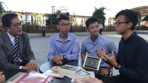 Mr YEUNG Kai-hin, Kevin (first right), a GEG, shares his experiences in tunnel blasting works.