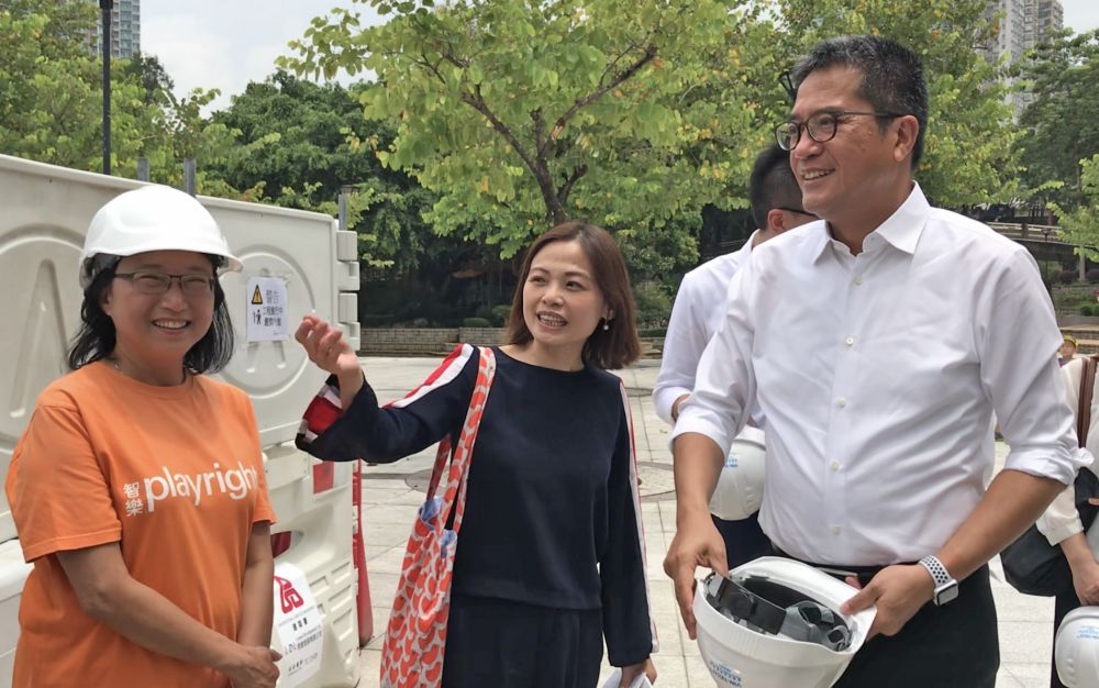 The Secretary for Development (SDEV), Mr WONG Wai-lun, Michael (right), accompanied by the Assistant Director (Architectural) of the Architectural Services Department (ArchSD), Ms YEUNG Lai-fong, Alice (centre), and the Executive Director of Playright Children’s Play Association (PCPA), Ms WONG Kin-ho, Kathy (left), visits the soon-to-open inclusive playground (IP) in Tuen Mun.