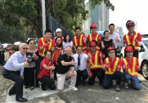 Group photo of the SDEV, Mr Michael WONG (fourth right, front row), and the volunteer team.