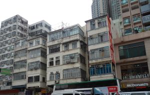 A completely rejuvenated building on Ma Tau Wai Road after the inspection and necessary repairs. Pictured is the building’s appearance before and after the repairs.
