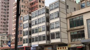 A completely rejuvenated building on Ma Tau Wai Road after the inspection and necessary repairs. Pictured is the building’s appearance before and after the repairs.