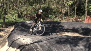 The training ground provides trails of different riding difficulties for beginner, intermediate and advanced cyclists.  Pictured is the trail specialist of the International Mountain Bicycling Association, Mr H.M. LIM, giving live demonstrations on the bike trails of different riding difficulties.