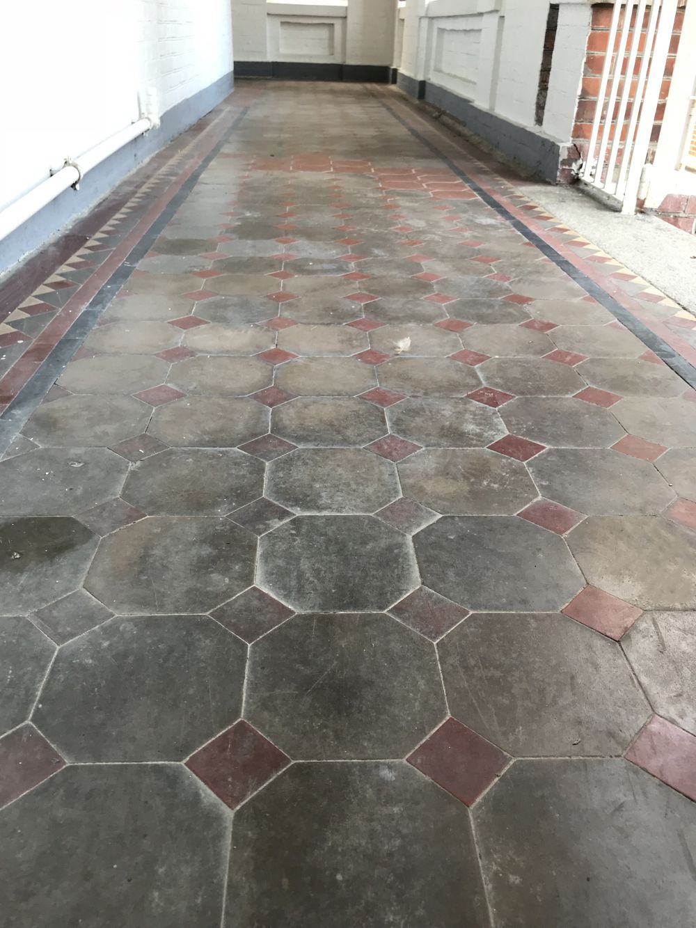 Over the years, the internal layouts of the Eliot Hall and May Hall have undergone successive renovations, but some of the fireplaces and the coloured floor tiles are preserved.