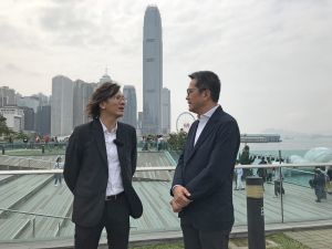 Mr WONG Wai-lun, Michael, Secretary for Development (SDEV)(right), and Mr NG Wing-shun, Vincent, Chairperson of the Harbourfront Commission (left), stroll along the harbourfront and talk about the strategies and visions on harbourfront enhancement.