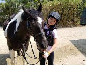 Janet’s daughter has been fond of horse riding since an early age. Janet hopes that her daughter will learn how to overcome difficulties on her own, and look afar and jump even further no matter what she does in the future.
