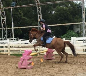 Janet’s daughter has been fond of horse riding since an early age. Janet hopes that her daughter will learn how to overcome difficulties on her own, and look afar and jump even further no matter what she does in the future.
