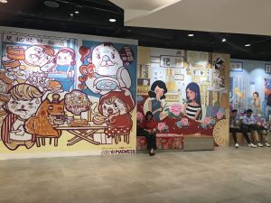 Massive murals inside H6 CONET showcasing the features and history of several streets, such as the former dai pai dongs (open air food stalls) at Gilman Street and the textile shops on Wong On Street.