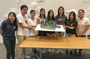 TSANG Kong-san, Nathan (third left), a student from the Teen Planners Group, says that they come to learn about the concepts of urban design in the three-day programme of field studies and lectures. 