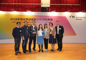 Koey (centre), selected as an outstanding apprentice, was pictured with her colleagues during the award ceremony in March this year.