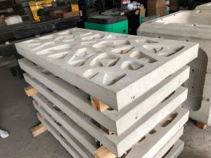 Pictured are enhanced seawall panels. Their uneven and rather rough surfaces can retain seawater and provide shade, facilitating the growth of microbial film and algae.