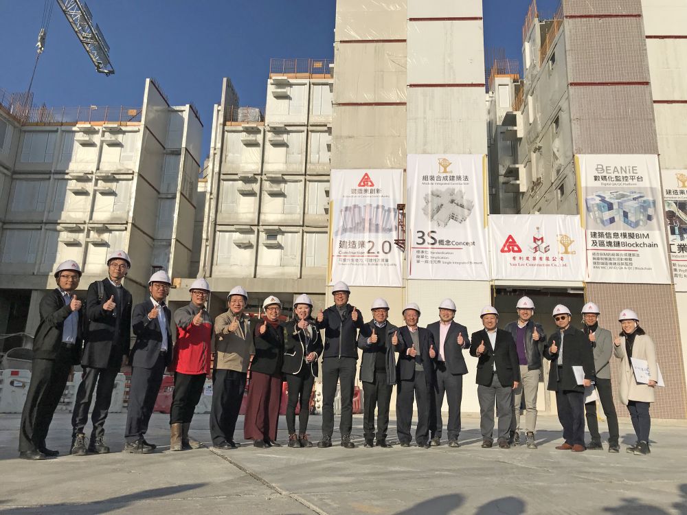 The Secretary for Development (SDEV), Mr WONG Wai-lun, Michael, (eighth left), inspects Hong Kong’s first public works project adopting Modular Integrated Construction (MiC) – the Disciplined Services Quarters for the Fire Services Department at Pak Shing Kok, Tseung Kwan O, with the Permanent Secretary for Development (Works) (PS(W)), Mr LAM Sai-hung (eighth right), the Director of Architectural Services, Mrs LAM YU Ka-wai, Sylvia (sixth left) and colleagues of the Architectural Services Department (ArchSD).