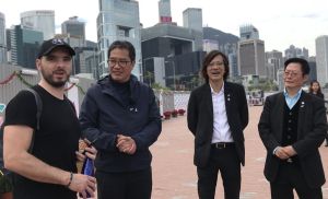 Michal, a tourist from the Czech Republic (first left), says the promenade is a cozy and peaceful place amid the busy town centre of Hong Kong.