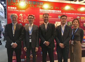The Director of Planning, Mr LEE Kai-wing, Raymond (centre), is pictured with his colleagues at the department’s exhibition booth.