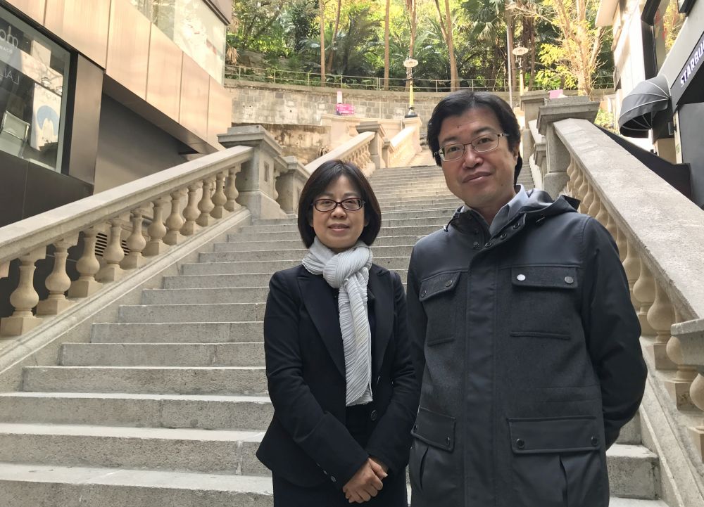The Executive Secretary (Antiquities & Monuments) of the Antiquities and Monuments Office (AMO) of the Development Bureau (DEVB), Ms Susanna SIU Lai-kuen, (left), and the Curator of the Historical Buildings Sub-unit of the AMO, Mr NG Chi-wo (right), state that their colleagues are determined to restore the Duddell Street Steps and Gas Lamps using original materials and craftsmanship when undertaking the restoration of the monument.