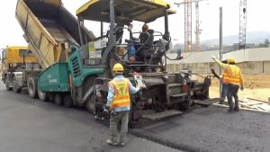 Workers in the picture are paving roads with bituminous materials. Since the Mainland quarries were once closed, the aggregates that are used to produce bituminous materials could not be supplied, which in turn affected the relevant work procedures.