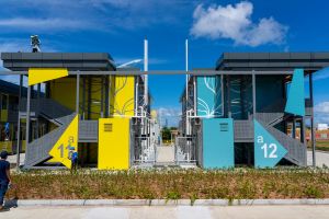 Pictured is the quarantine camps at Penny’s Bay (phase 1). There is a dirty corridor behind each row of quarantine units, where drainage and ventilating pipes are installed. No persons other than the personnel are allowed to enter and exit via the corridor in order to minimise the risk of infection.