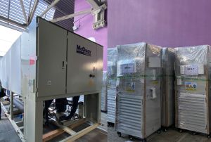 On the left of the picture is a chiller, while Mobile Modular High Efficiency Particulate Air Filtering Units are on the right.