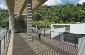 The sports centre is located in a peaceful environment with a backdrop of the mountains.