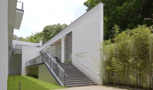 The sports centre is located in a peaceful environment with a backdrop of the mountains.