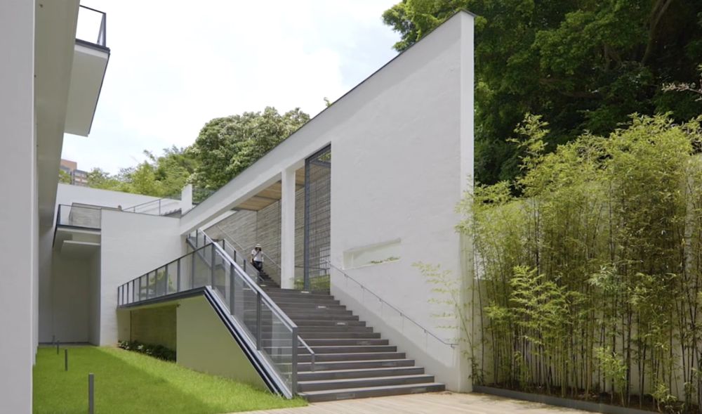 The sports centre is located in a peaceful environment with a backdrop of the mountains.