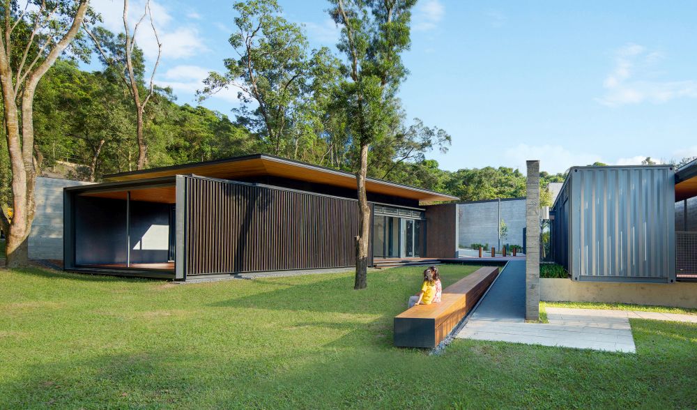 On the left of the picture is the multi-purpose room, while the caretakers’ office and reception area are on the right. The lawn between the two buildings is preserved for outdoor activities.